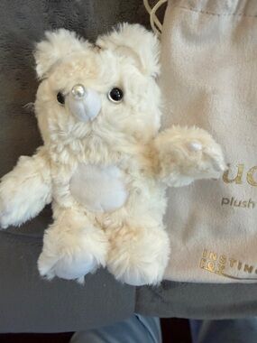 Muckey Plush with velvet Bag cute white plush and trademark eyes 👀 on behind.